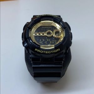 G SHOCK black and gold